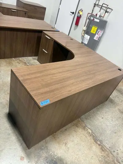 Modern Walnut Porkchop shaped L shaped desk with 2 sets of deluxe drawers at Peach State Office Furniture, Atlanta